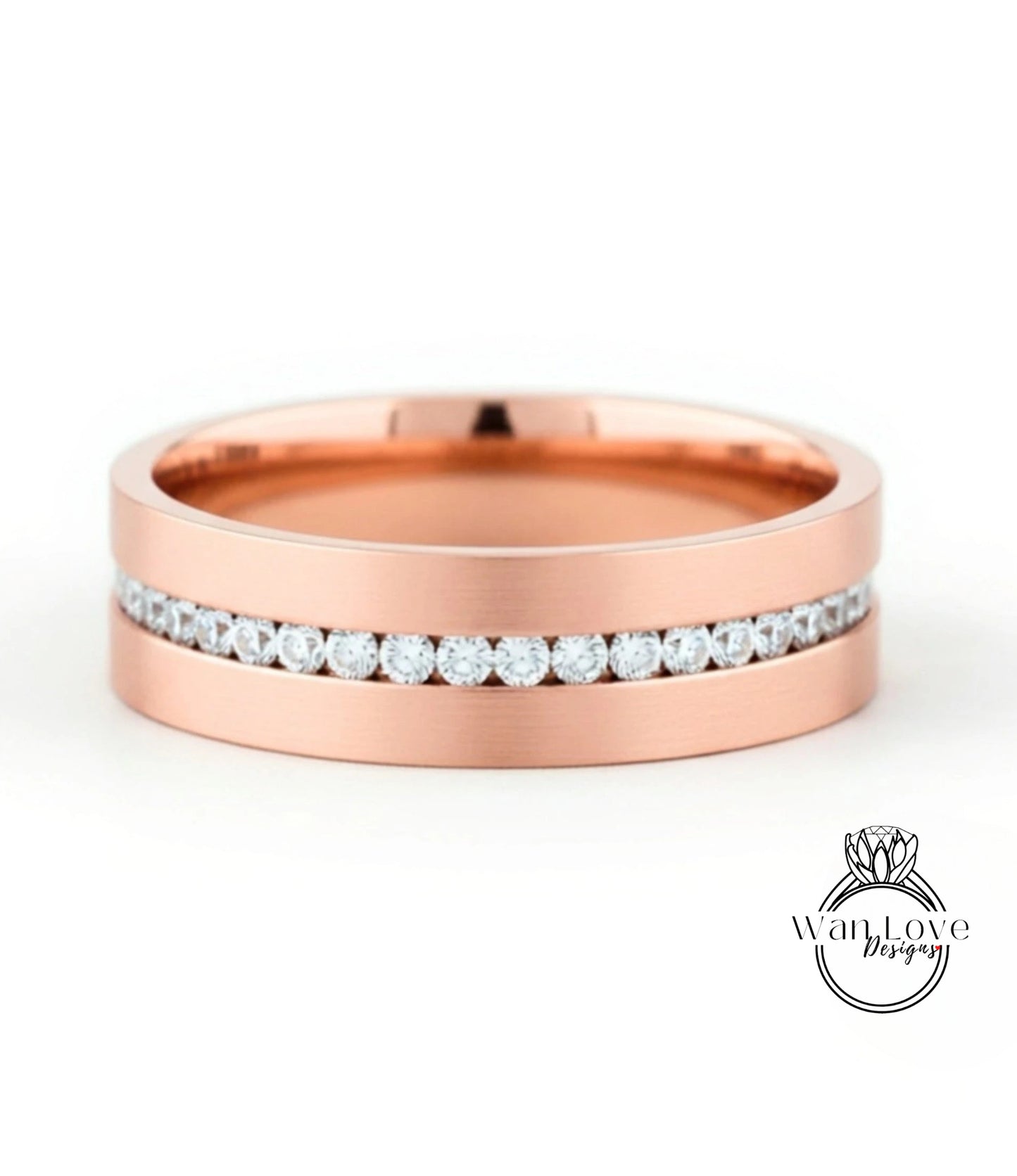 A rose gold wedding band with a row of diamonds set in the band.