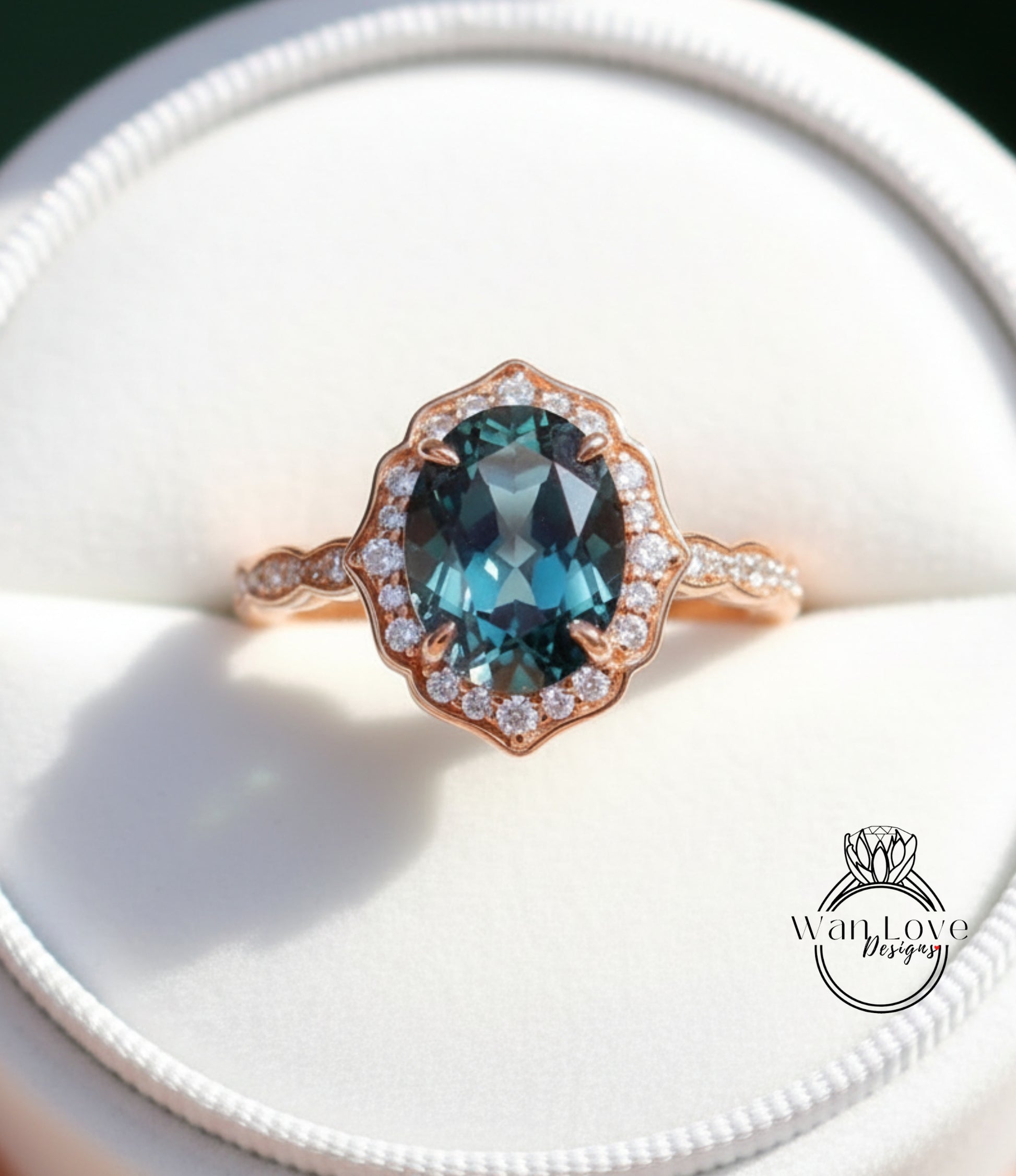 A close-up image of a gold ring with a large blue gemstone, possibly a sapphire, set in a halo of smaller diamonds.