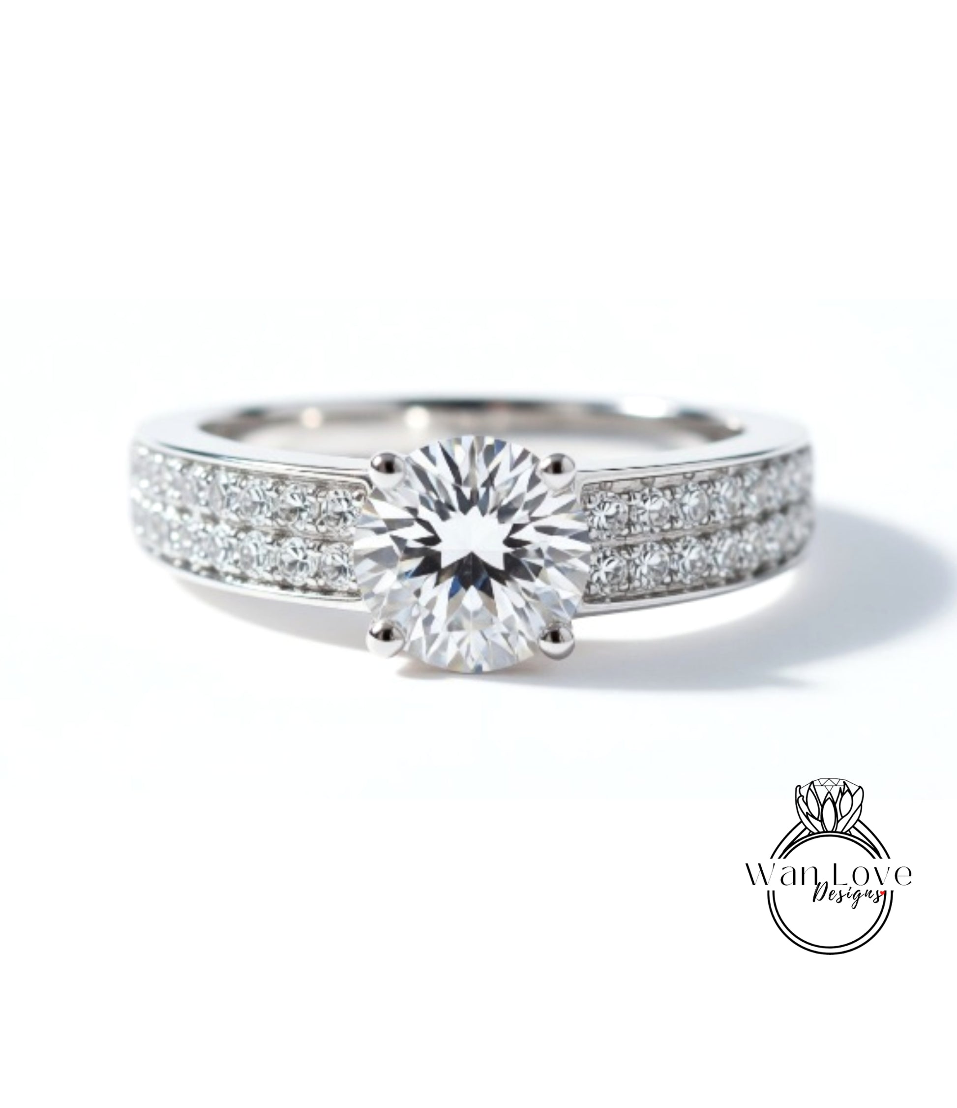 A close-up view of a diamond engagement ring with a large central diamond surrounded by smaller diamonds set in a band.