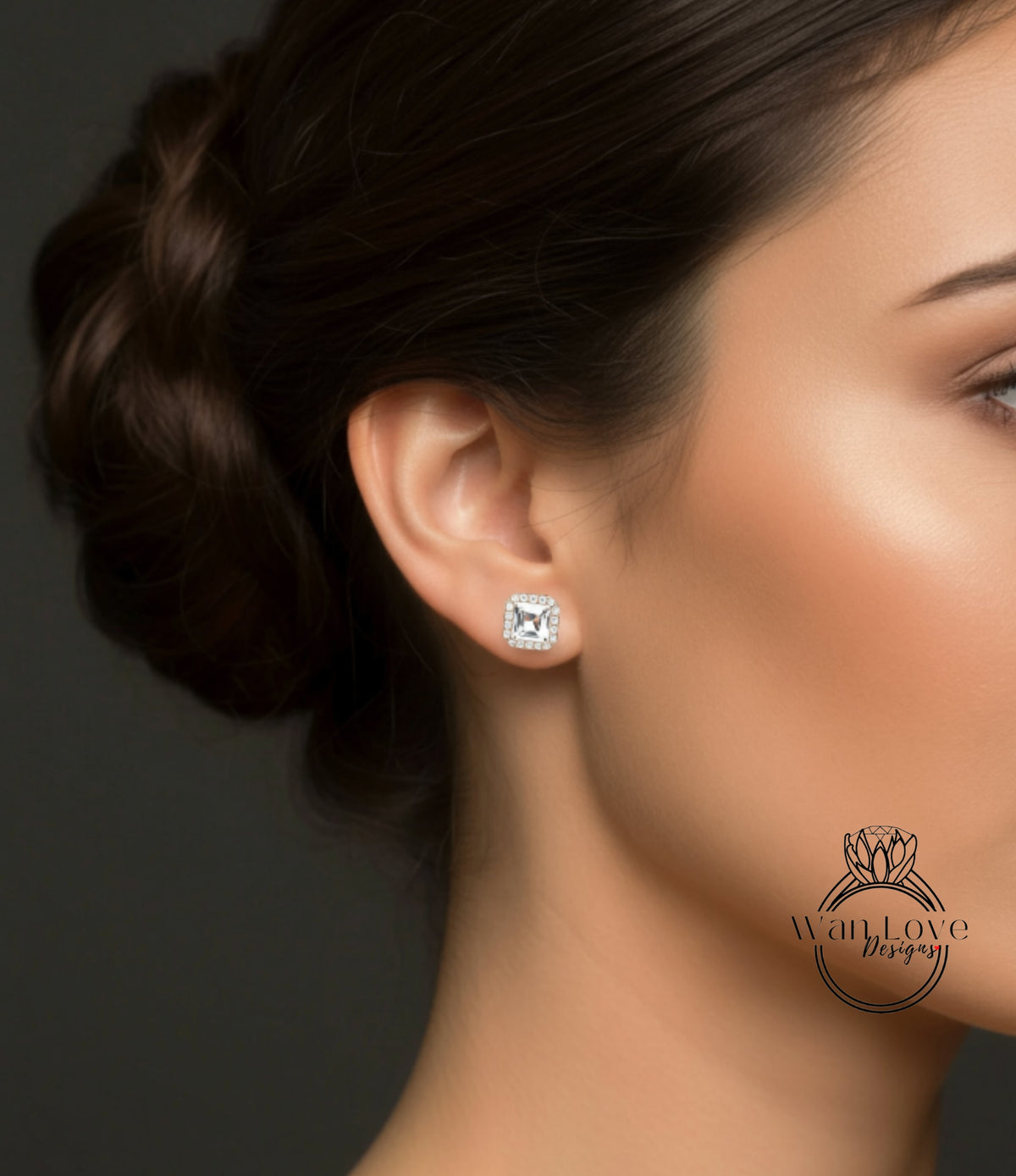 A close-up of a woman's ear with a diamond earring, showcasing the earring and the woman's face.