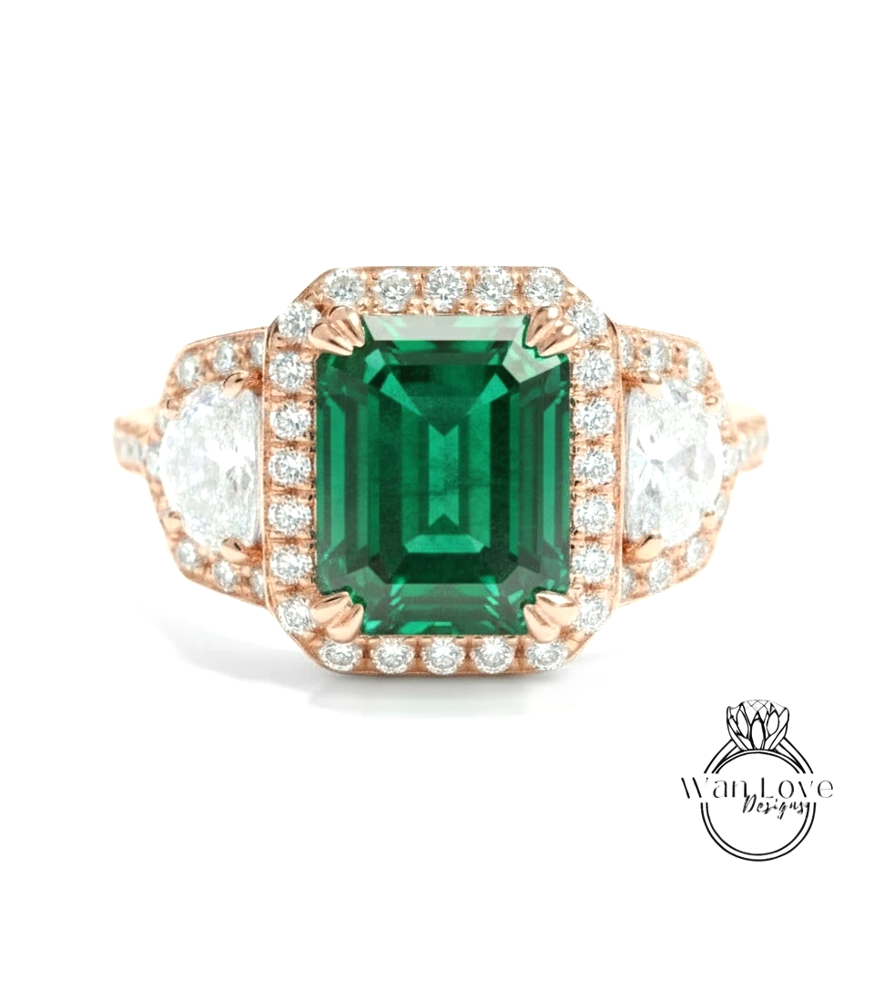 A stunning engagement ring with a large, vibrant green gemstone surrounded by a halo of smaller diamonds set in a rose gold band.