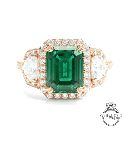 A stunning engagement ring with a large, vibrant green gemstone surrounded by a halo of smaller diamonds set in a rose gold band.