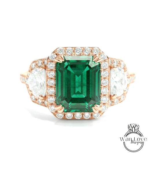 A stunning engagement ring with a large, vibrant green gemstone surrounded by a halo of smaller diamonds set in a rose gold band.