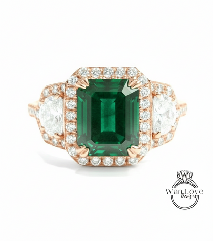 A stunning engagement ring with a large, vibrant green gemstone surrounded by a halo of smaller diamonds set in a rose gold band.