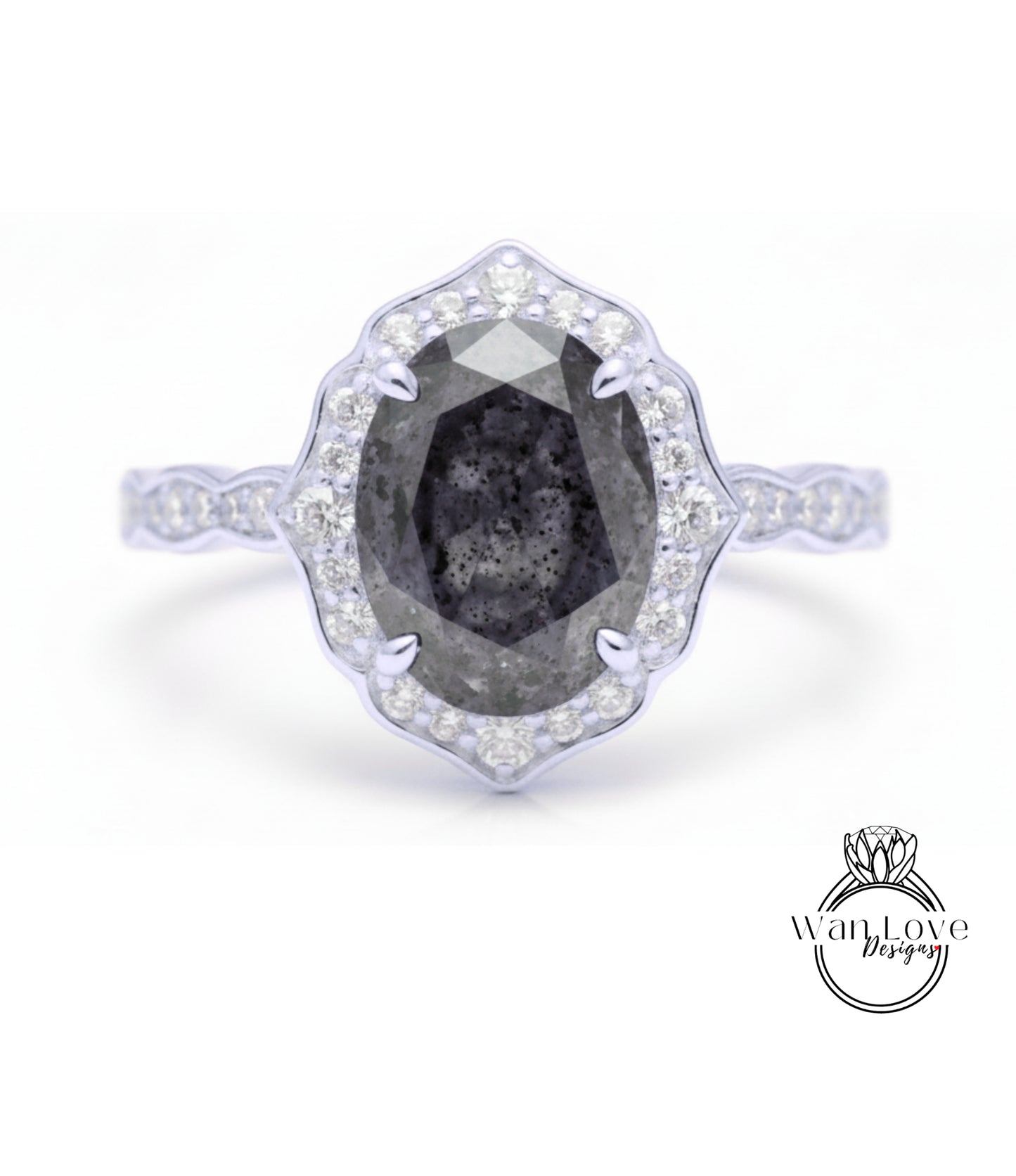 A silver ring with a large oval-shaped diamond at the center, surrounded by smaller diamonds.