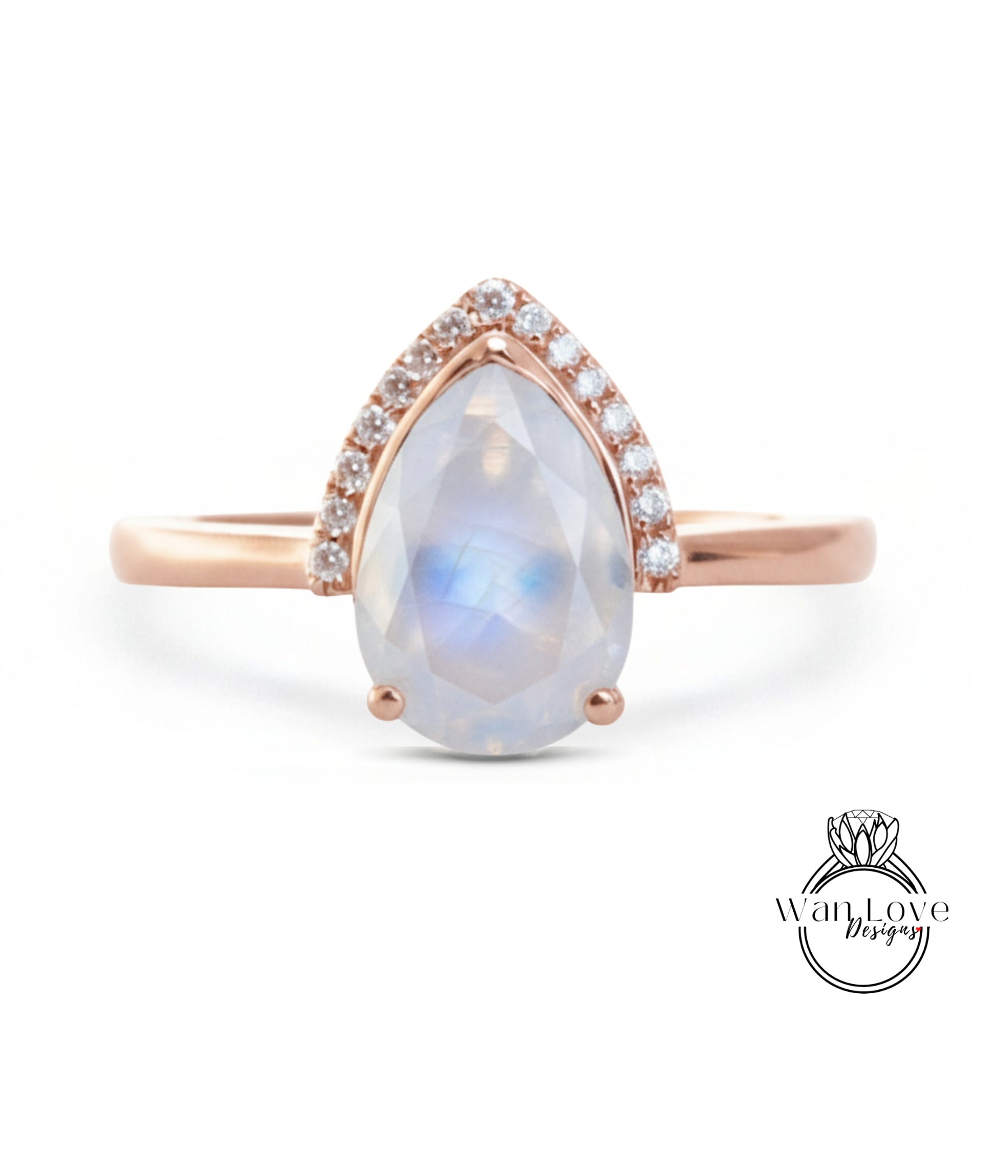 A rose gold ring with a large, clear gemstone set in the center, surrounded by smaller diamonds.