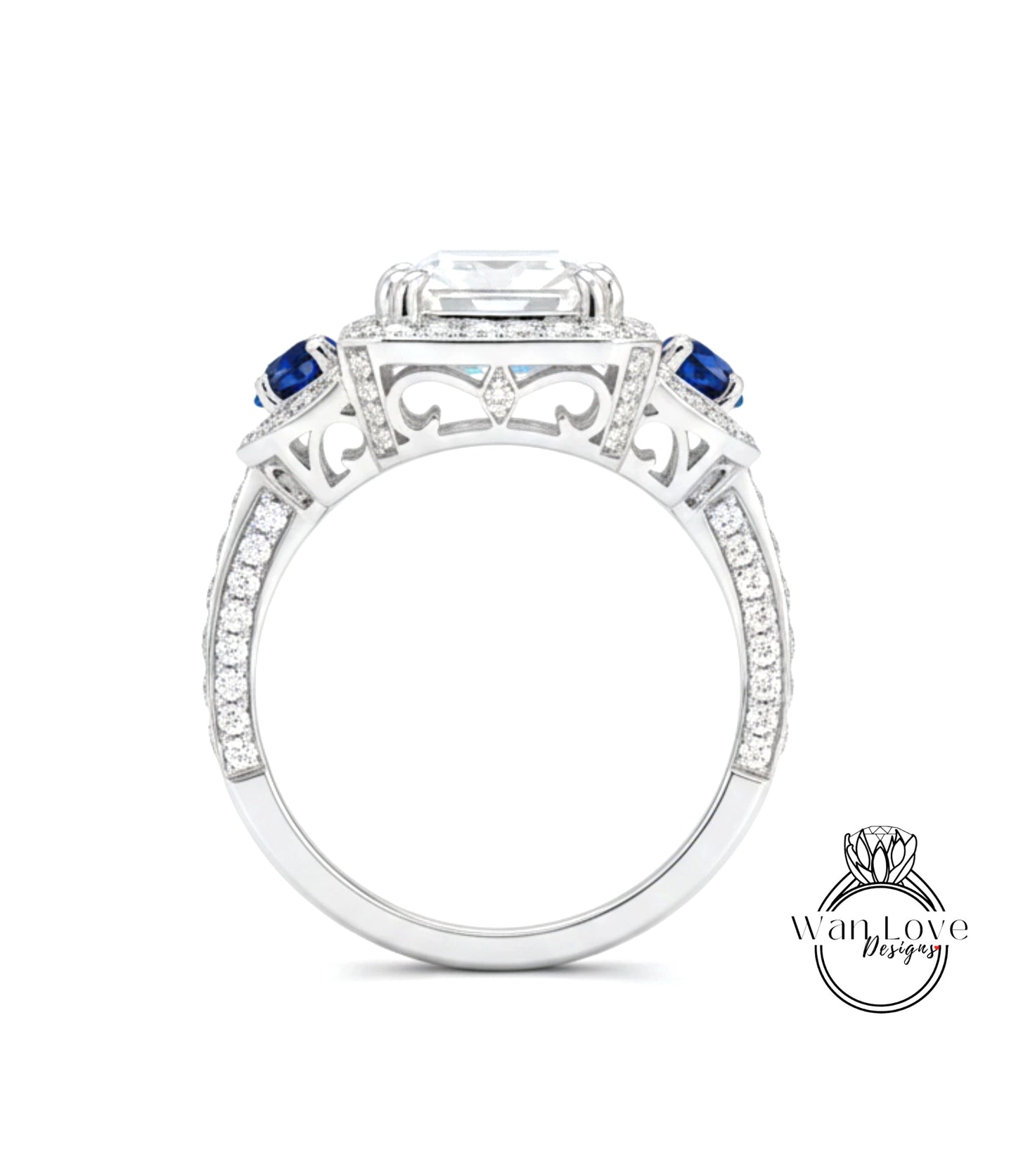 A close-up view of a silver ring with a large central gemstone, surrounded by smaller gemstones and intricate metalwork.