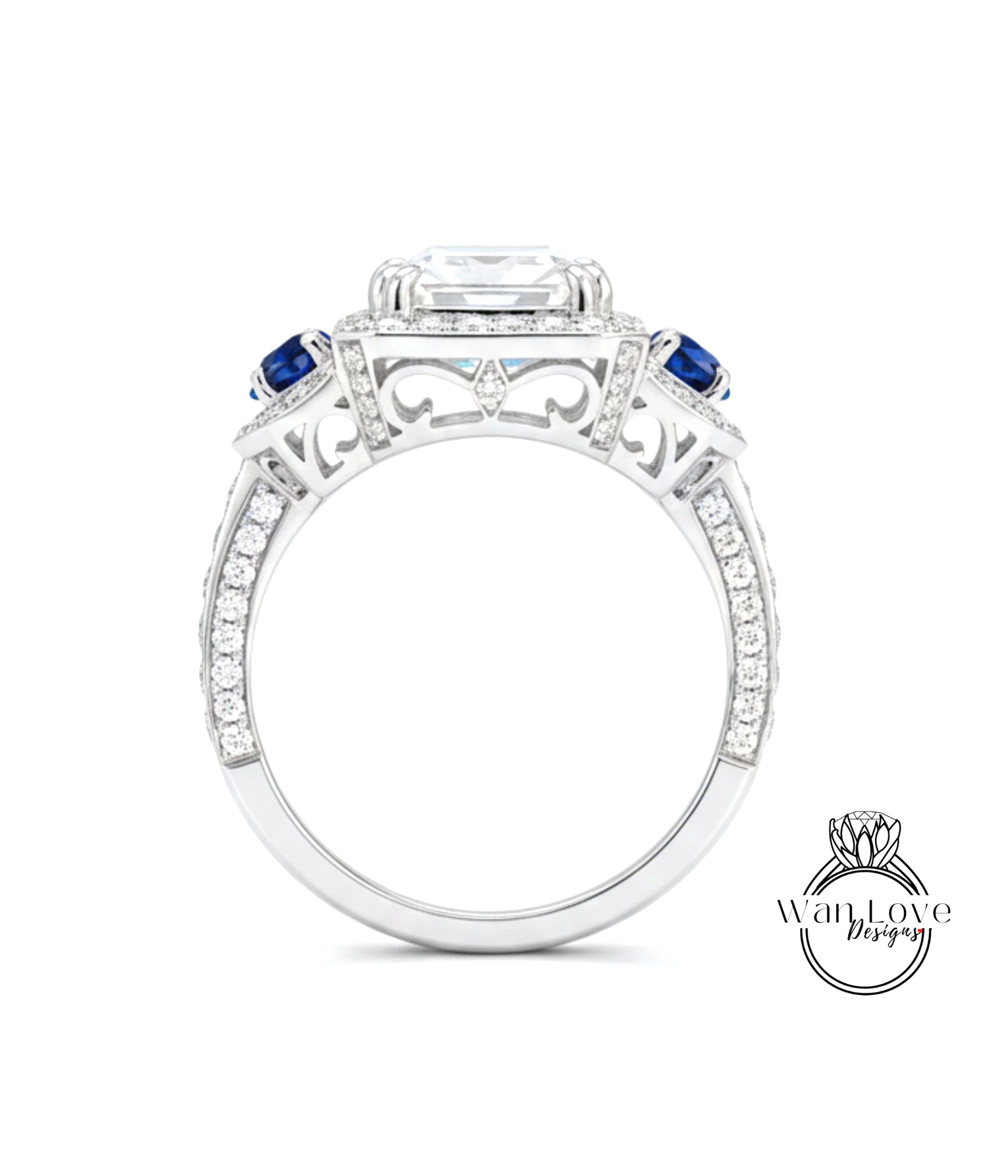 A close-up view of a silver ring with a large central gemstone, surrounded by smaller gemstones and intricate metalwork.