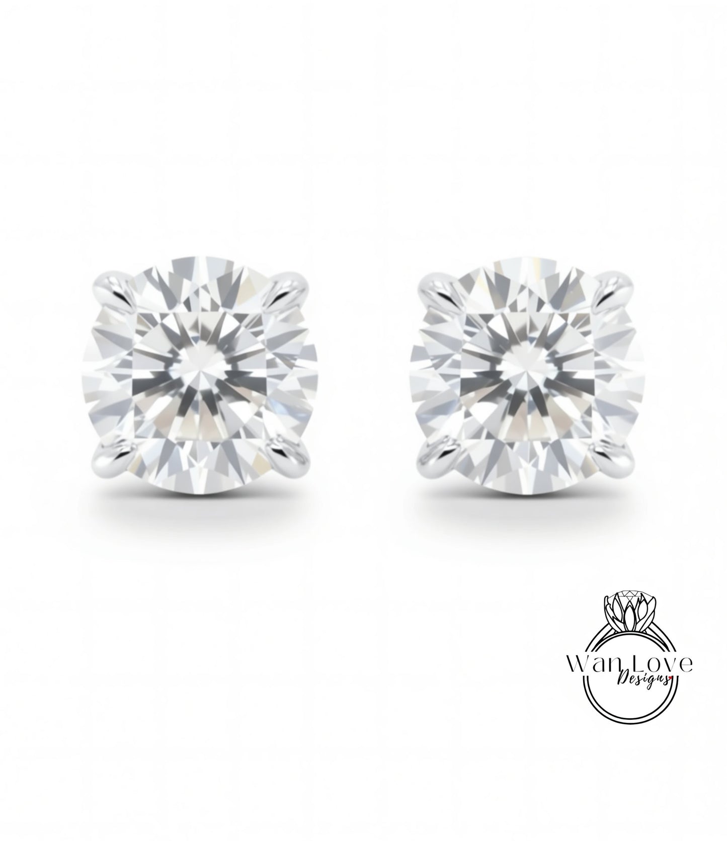 A pair of elegant diamond earrings with a large, brilliant-cut diamond set in a silver metal earring.