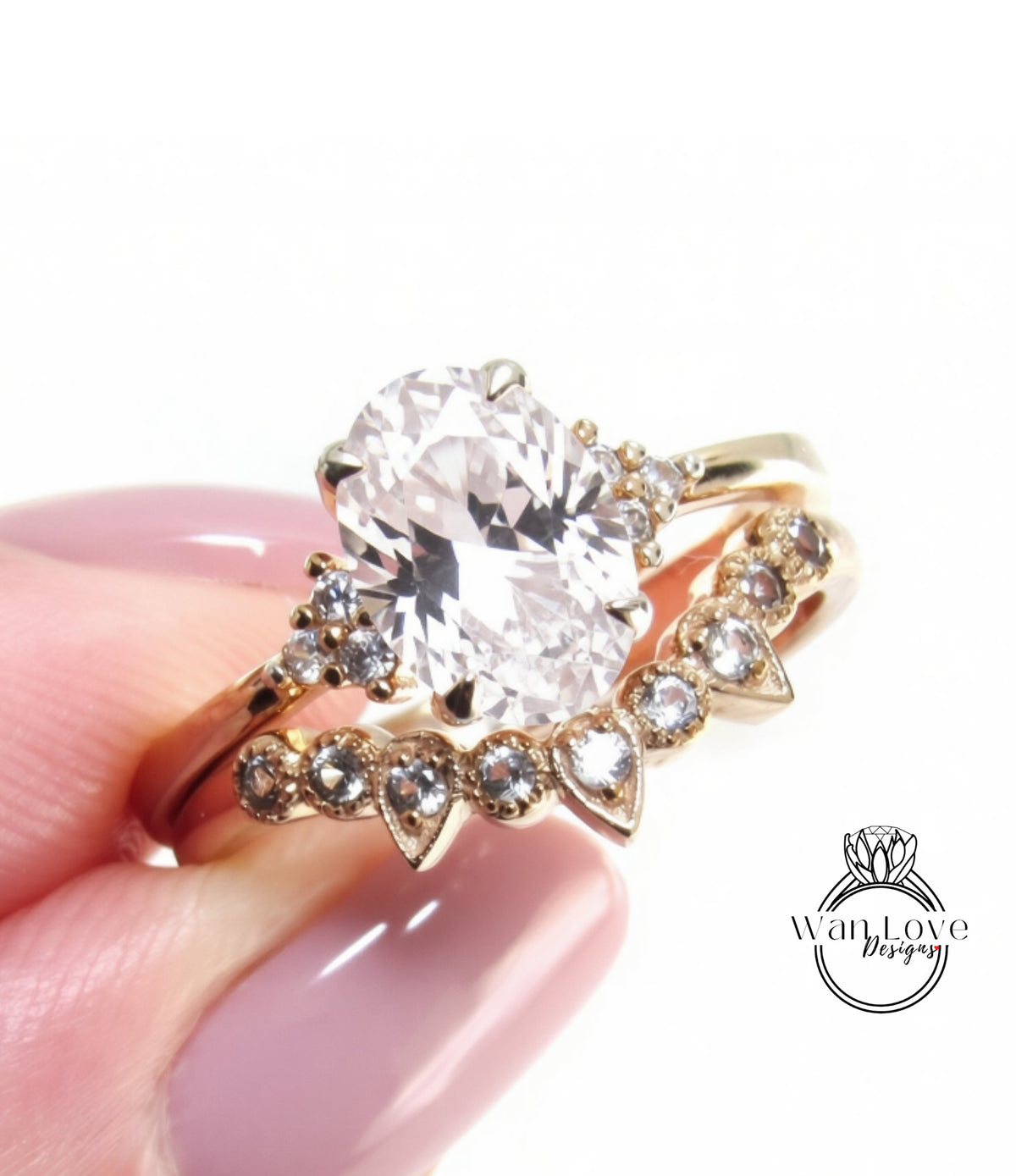 A close-up image of a gold ring with a large oval-shaped gemstone, possibly a diamond, set in a band with smaller gemstones.