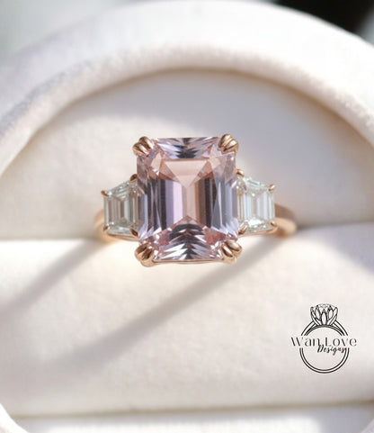 A close-up image of a gold ring with a large pink gemstone, showcasing the intricate details and craftsmanship of the jewelry.