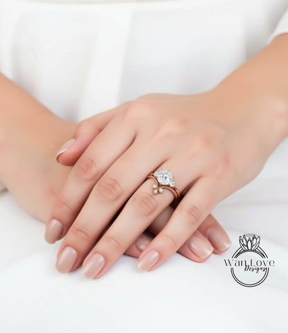 A close-up image of a person's hands wearing a diamond engagement ring.