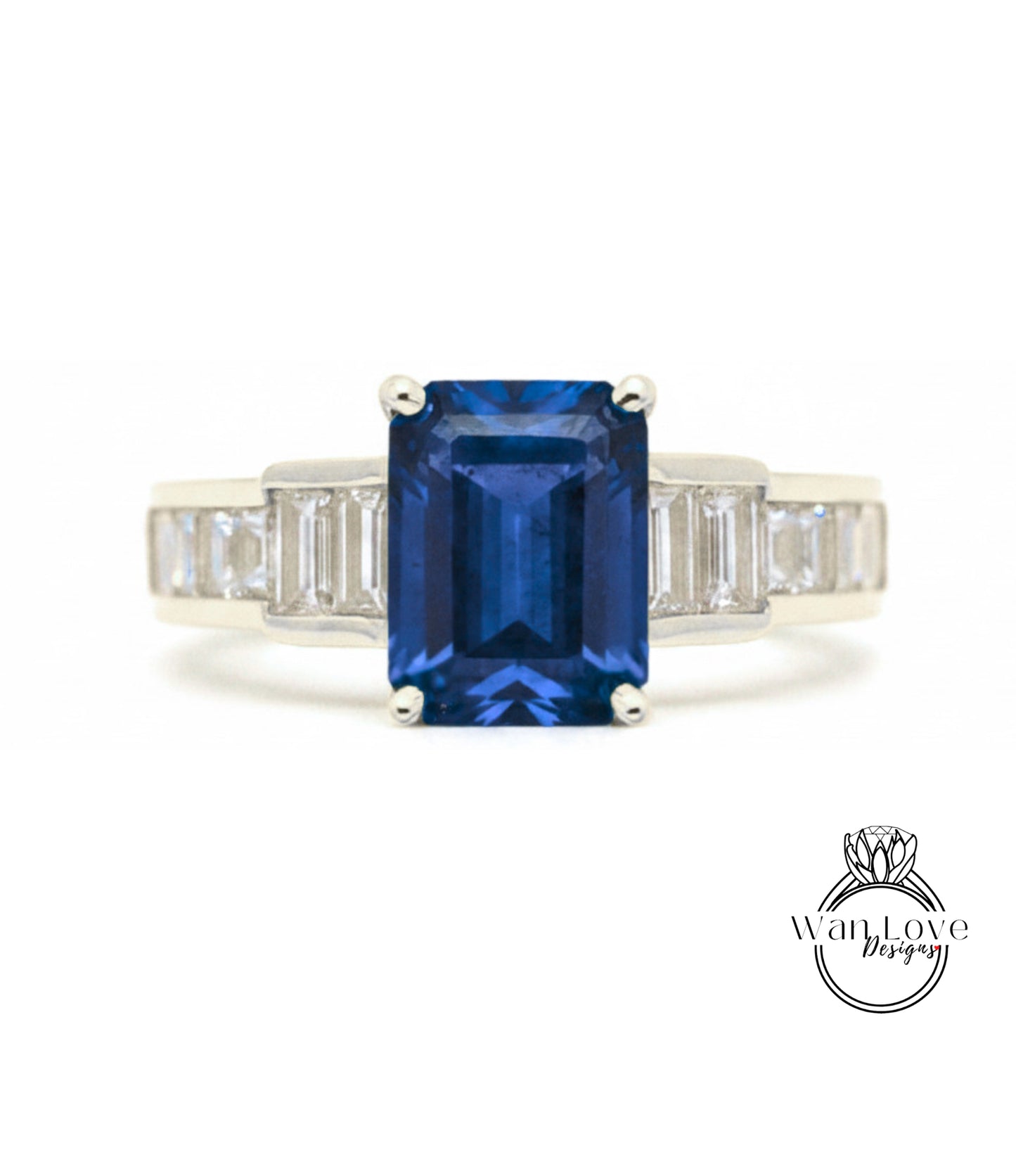 A ring featuring a large blue gemstone, possibly a sapphire, surrounded by smaller diamonds.