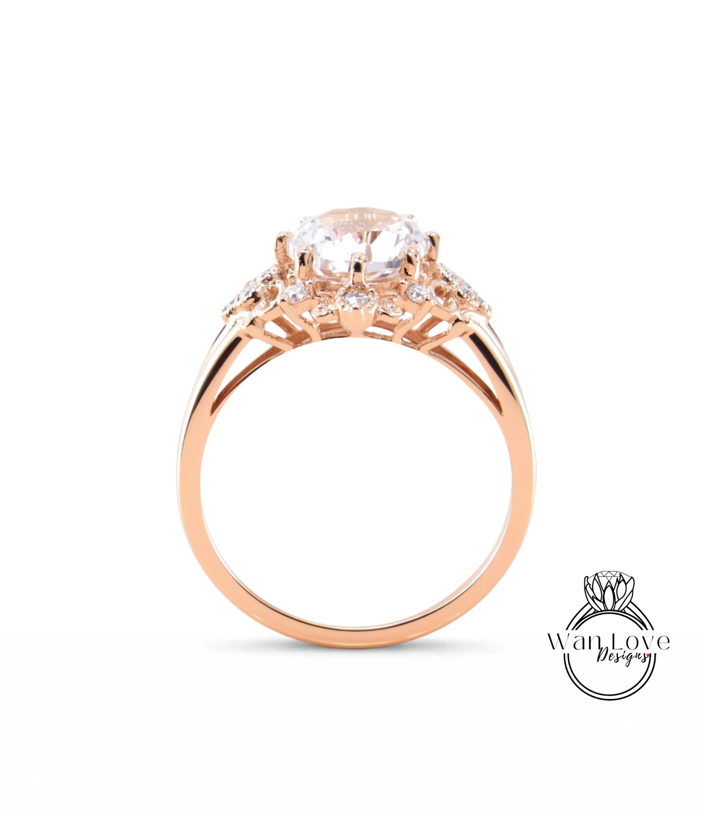 A gold ring with a large central diamond surrounded by smaller diamonds, set in a rose gold band.