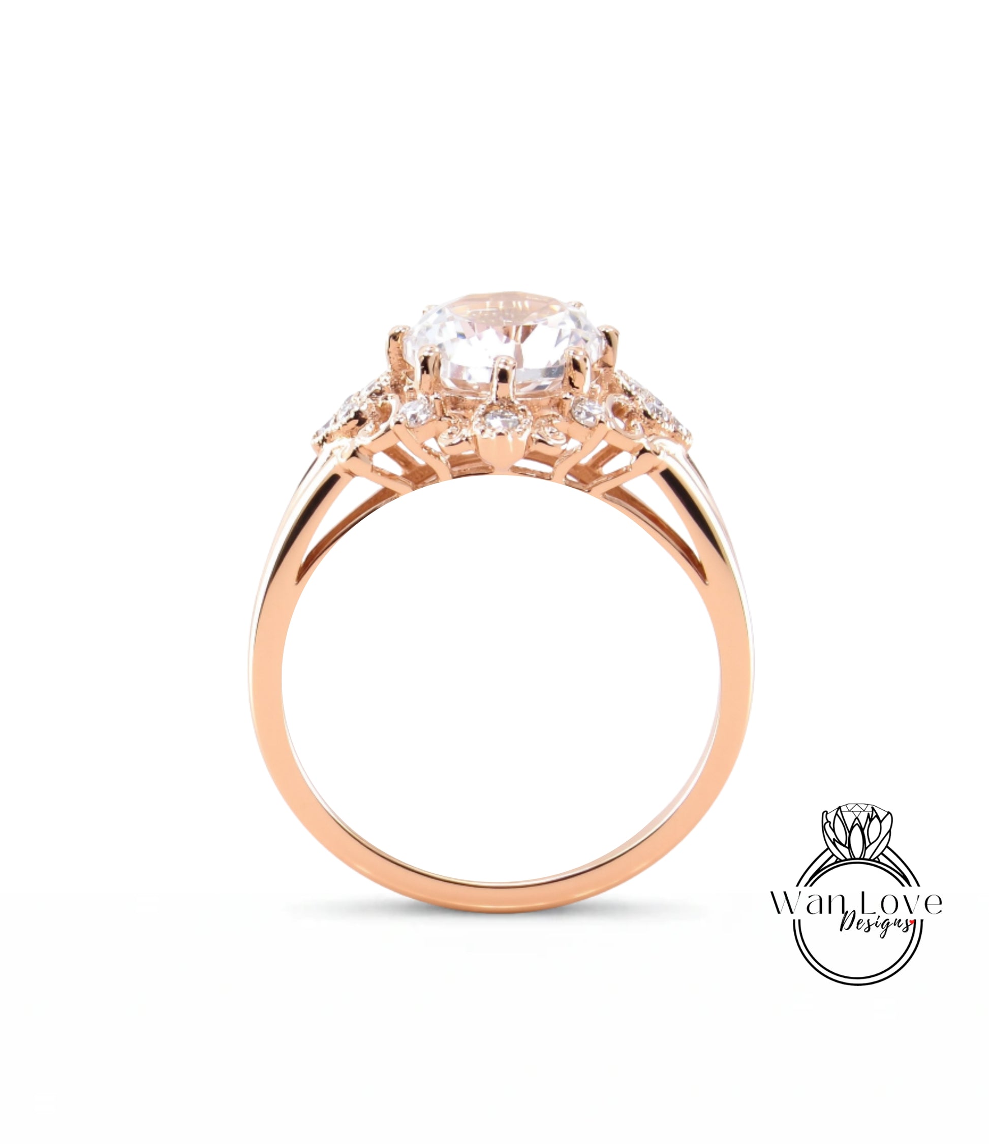 A gold ring with a large central diamond surrounded by smaller diamonds, set in a rose gold band.