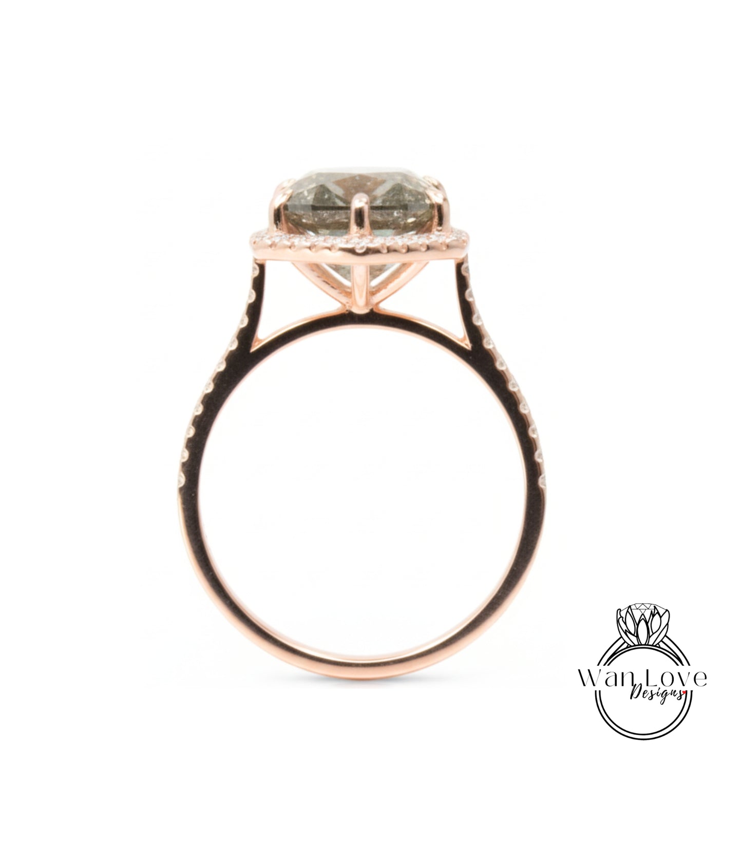 A rose gold engagement ring with a large round diamond set in the center, surrounded by smaller diamonds.