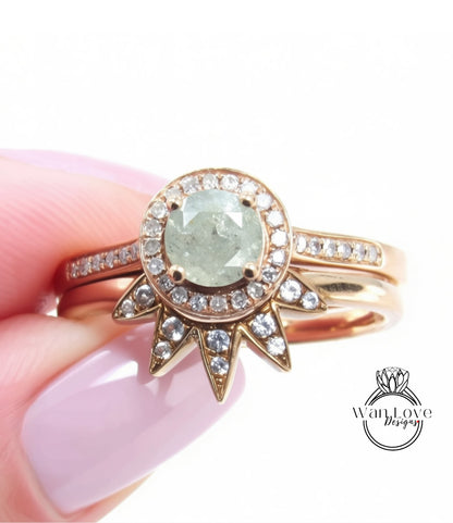 A close-up of a gold ring with a large diamond center stone surrounded by smaller diamonds, with a star-shaped accent piece.