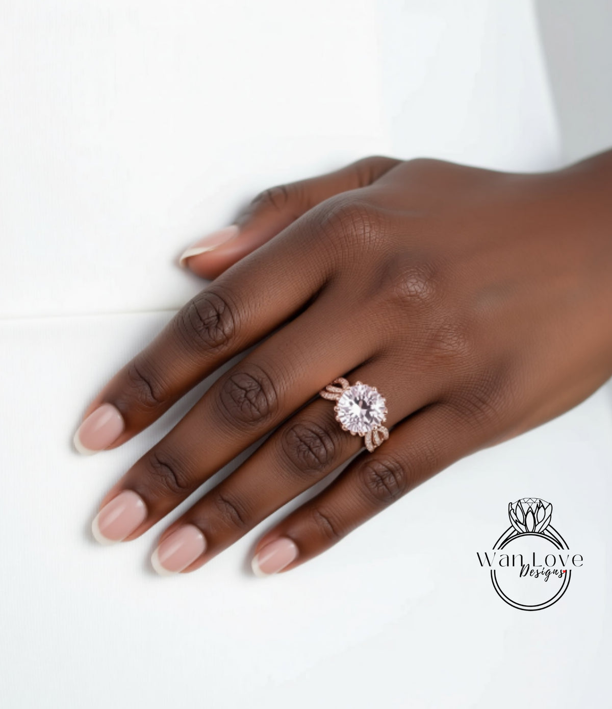 A close-up of a hand wearing a large, ornate ring with a large central stone.