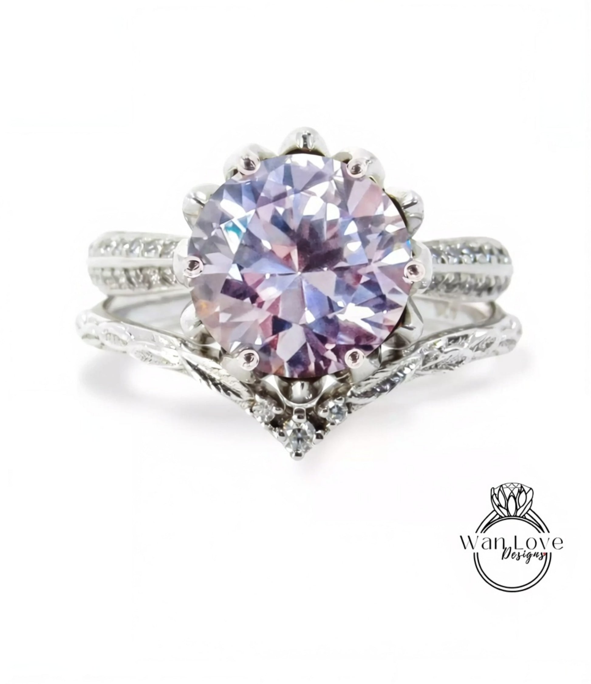 A close-up image of a silver ring with a large, round purple gemstone at the center, surrounded by smaller diamonds and a decorative band.