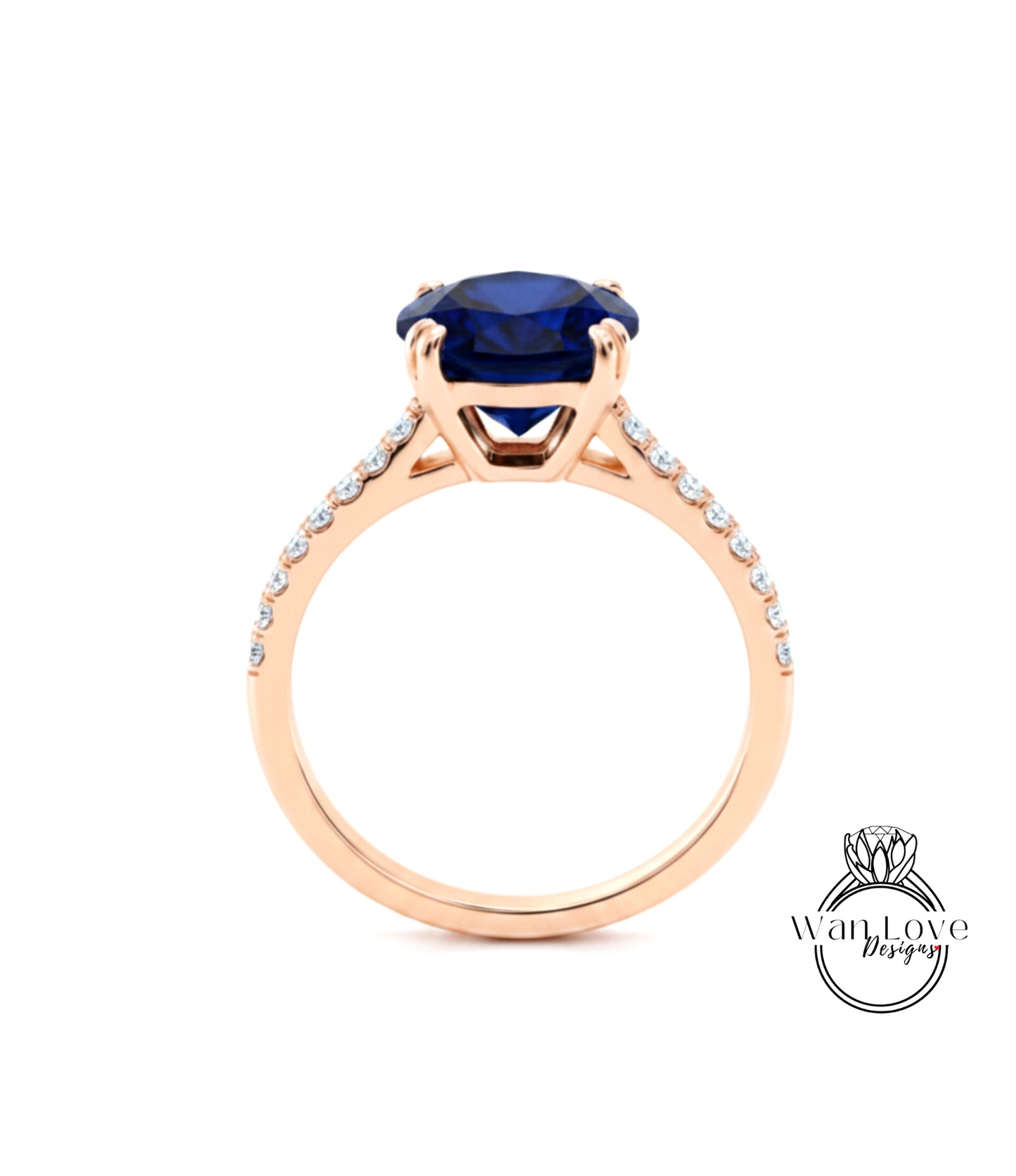 A gold ring with a large blue gemstone set in the center, surrounded by smaller diamonds.