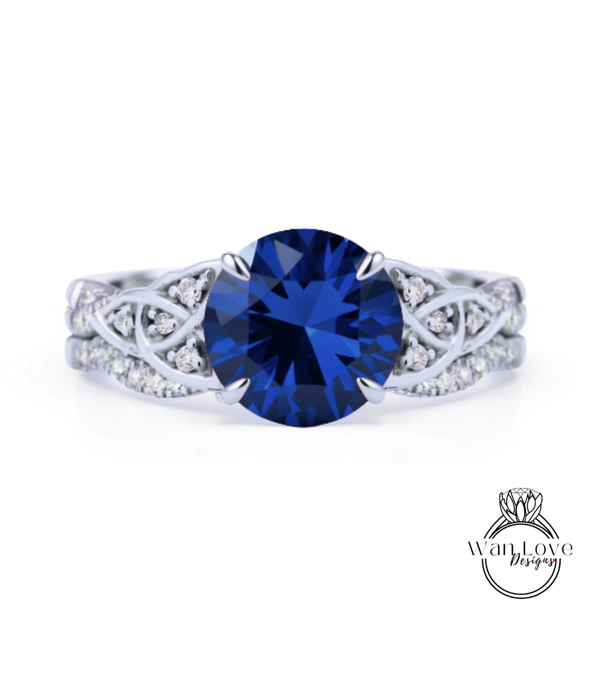 A silver ring with a large blue gemstone, possibly a sapphire, set in a decorative band.