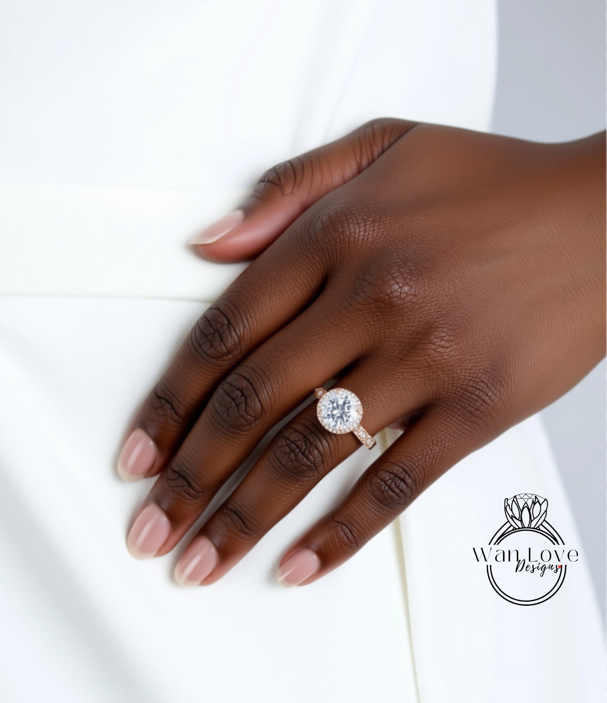 A close-up of a hand wearing a large, sparkling diamond engagement ring.