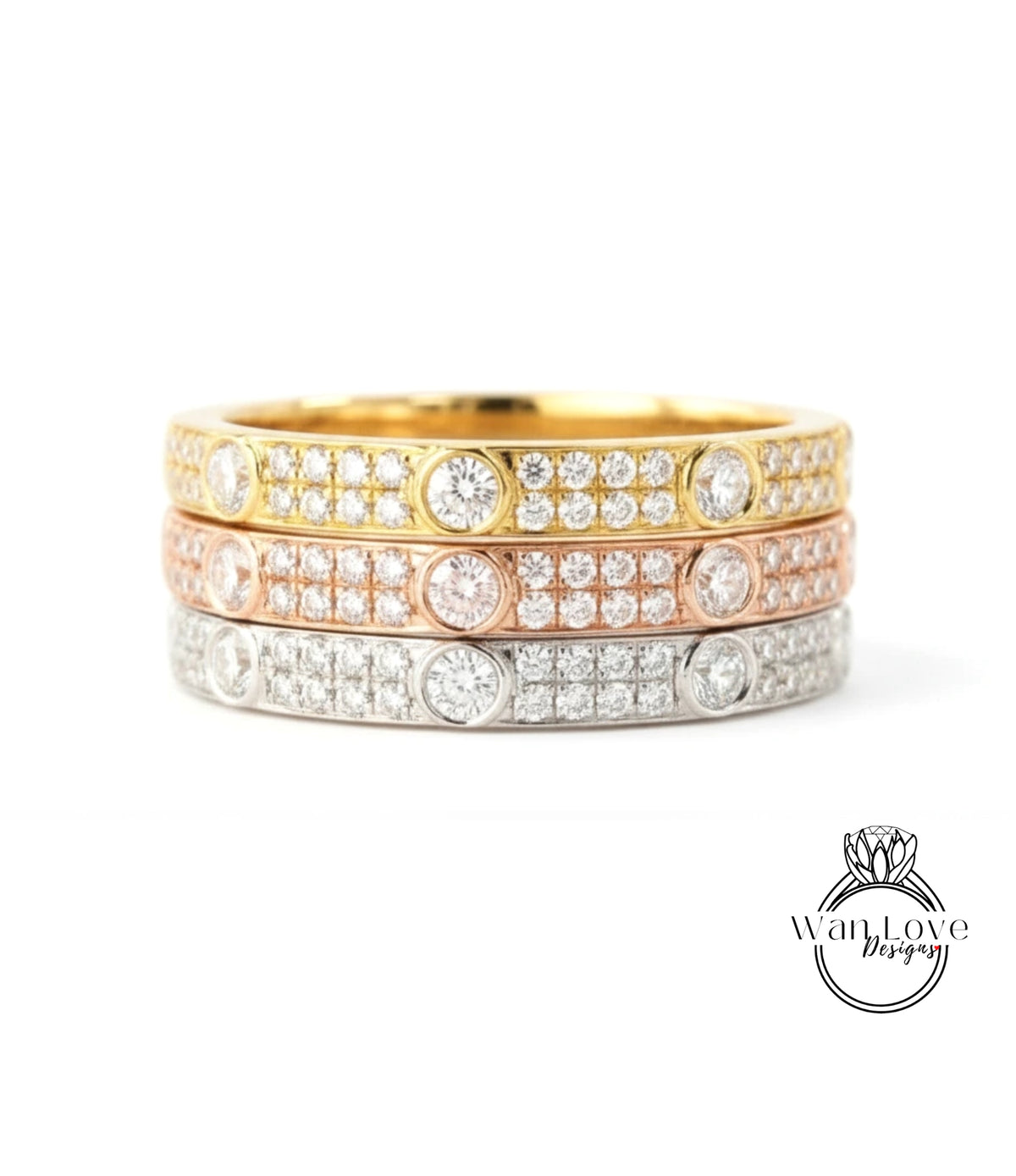 A ring with three concentric bands of diamonds in various colors, including gold, silver, and pink.
