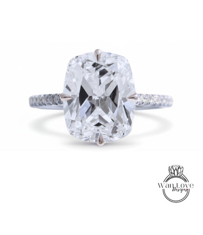 A large, clear diamond engagement ring with a prominent center stone.