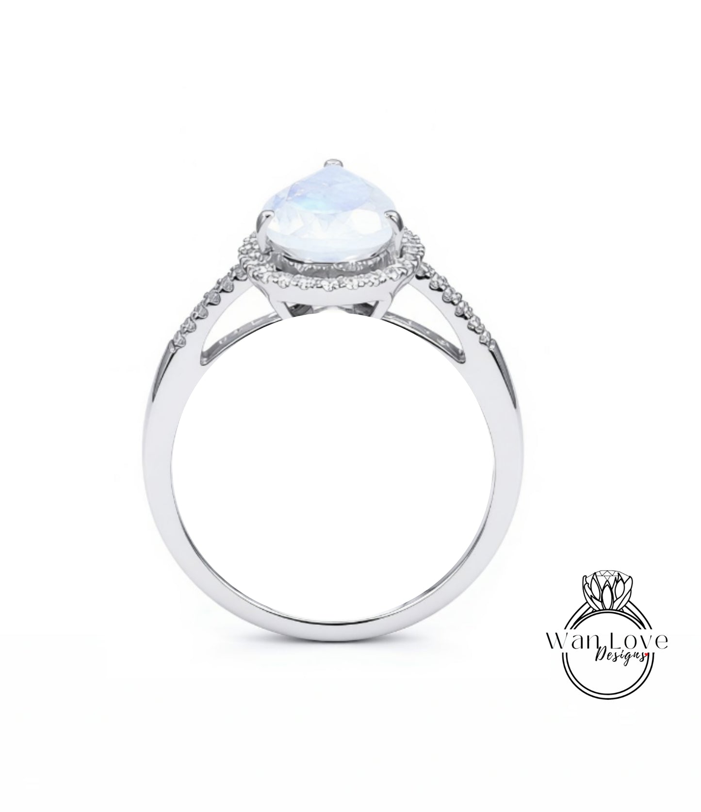 A silver engagement ring with a large oval-shaped gemstone, likely a diamond, at the center. The ring has a halo of smaller diamonds around the gemstone.