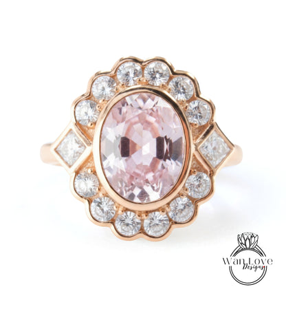 A gold ring with a large oval-shaped gemstone at the center, surrounded by smaller diamonds.