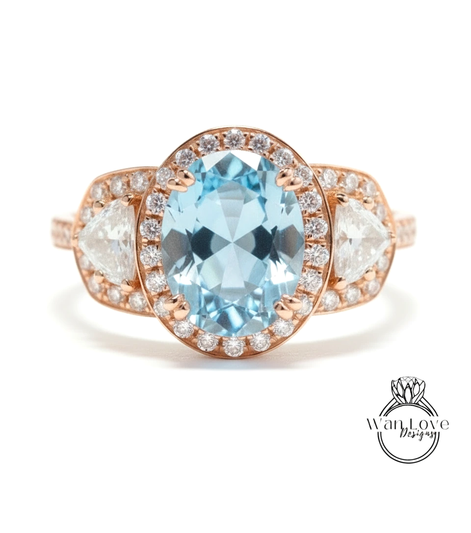 A beautiful ring featuring a large oval-shaped blue gemstone surrounded by smaller diamonds, set in a rose gold band.