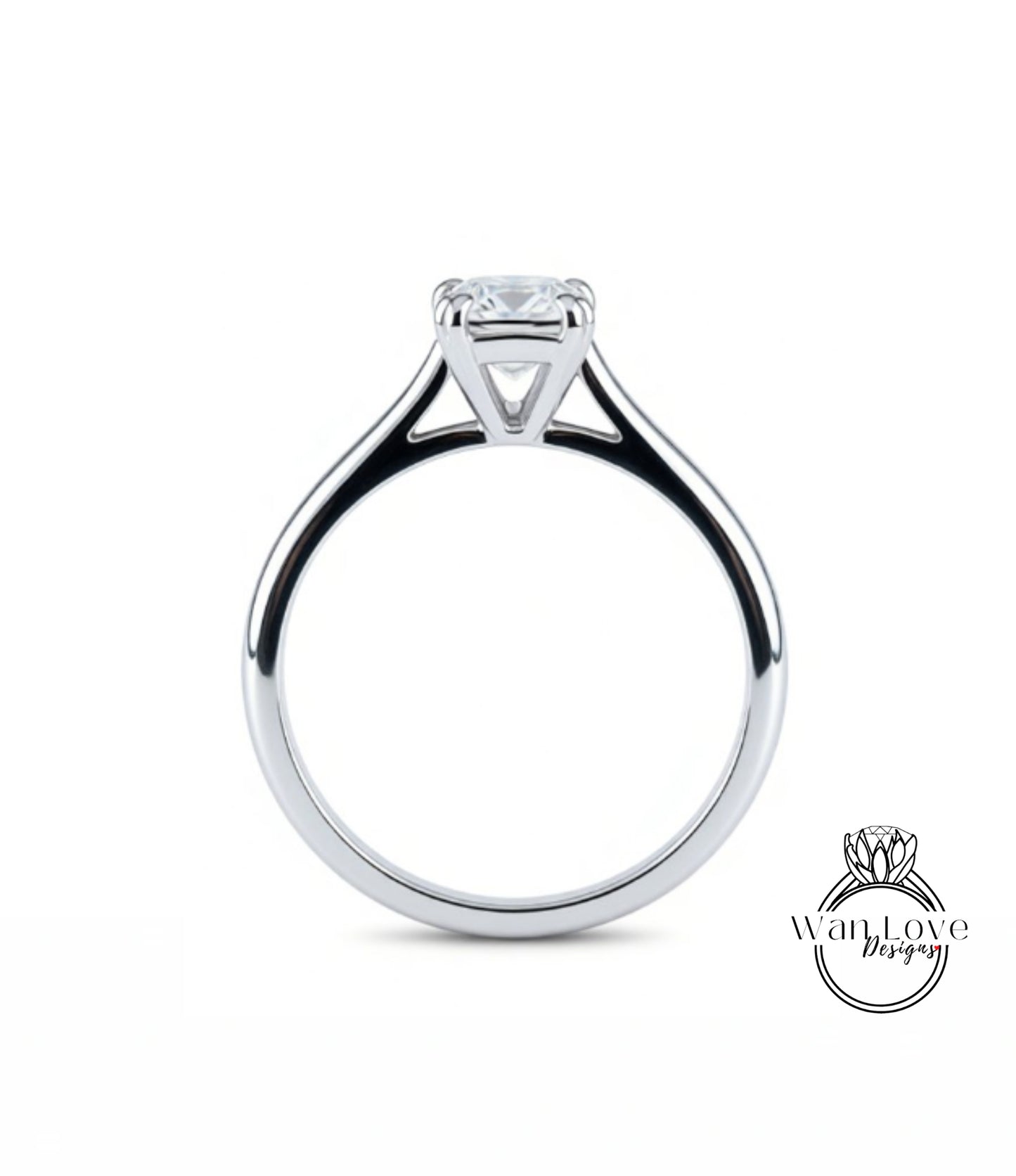 A silver engagement ring with a large central diamond.
