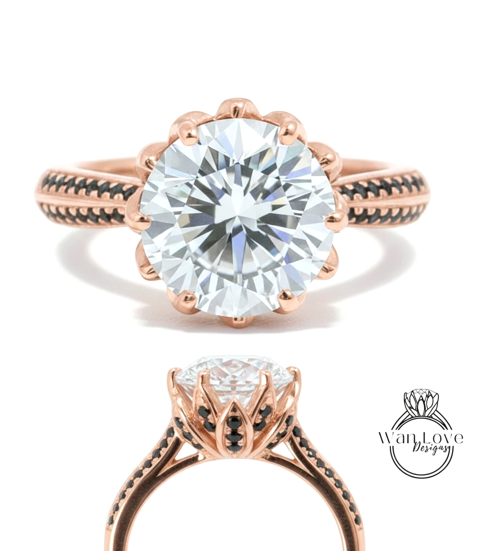 a beautiful rose gold ring with a large, round diamond set in the center. The ring has a scalloped edge and a black band around the base, creating an elegant and eye-catching design.