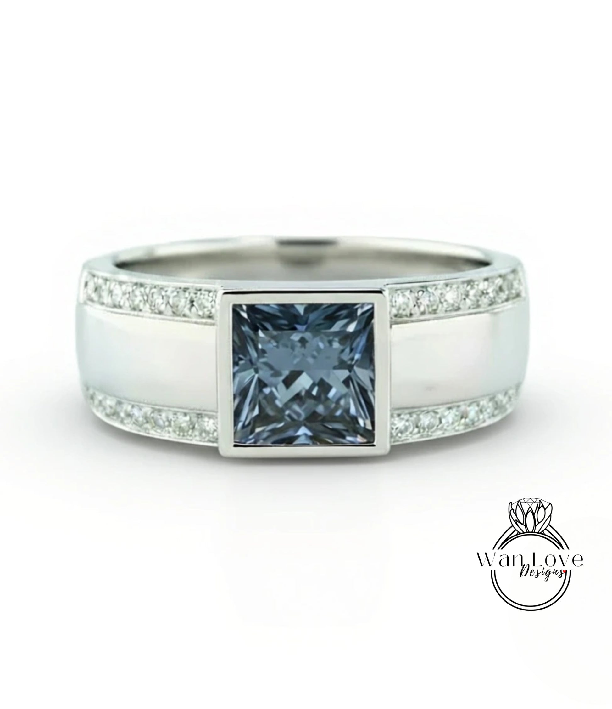 A silver ring with a large blue gemstone in the center, surrounded by smaller diamonds.