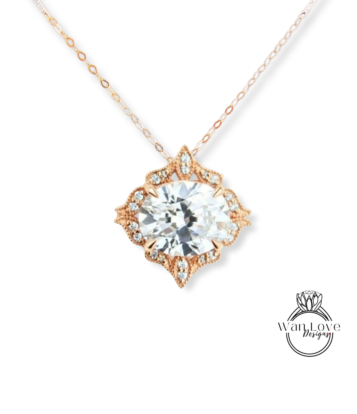 A necklace with a large, clear gemstone set in an ornate, floral-designed metal frame.