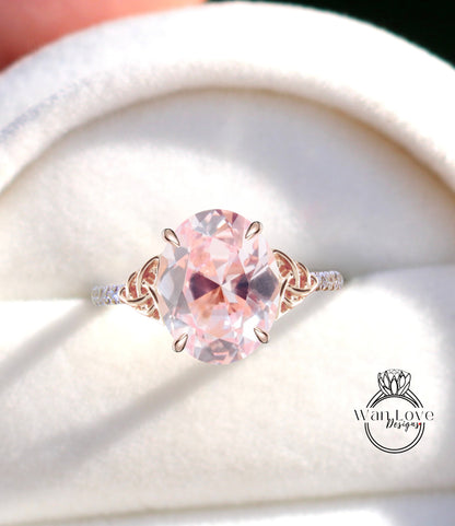 Anello di fidanzamento ovale con diamante zaffiro rosa chiaro con nodo celtico Anello con mezza eternità con diamante celtico Moissanite Promessa nuziale ovale Anniversario