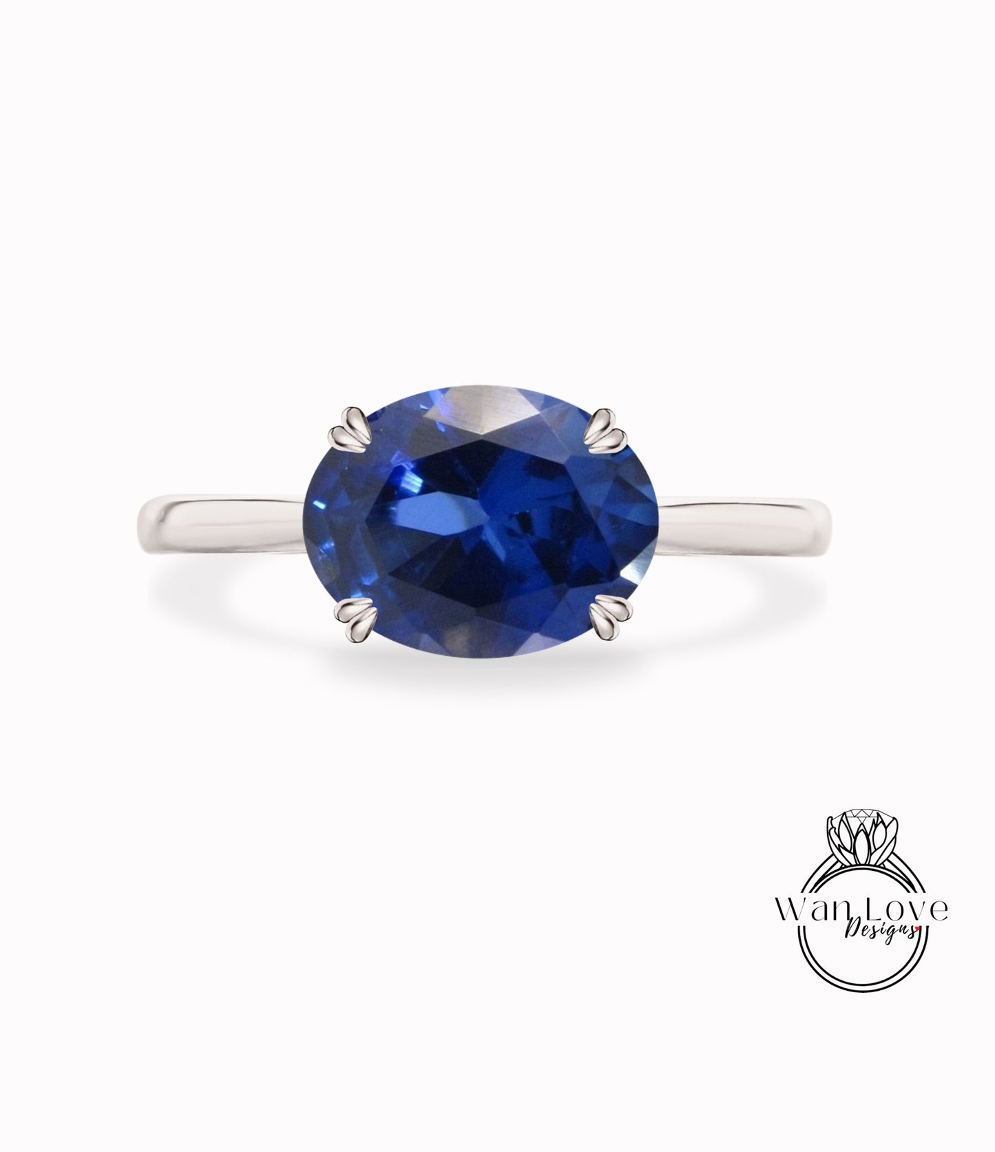 anello ovale in zaffiro blu, anello di fidanzamento con zaffiro blu, montatura est-ovest, anello con zaffiro a taglio ovale