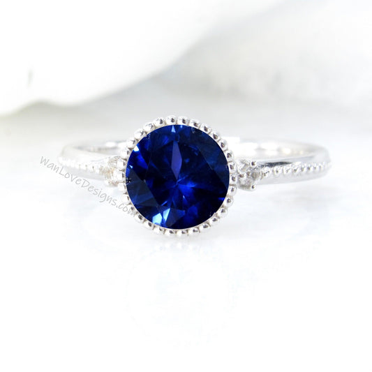 Blue Sapphire Round Diamond Ring, Round Cut Sapphire Ring in Milgrain Bezel Setting, 3 Gem Stone Round Engagement Ring Wan Love Designs