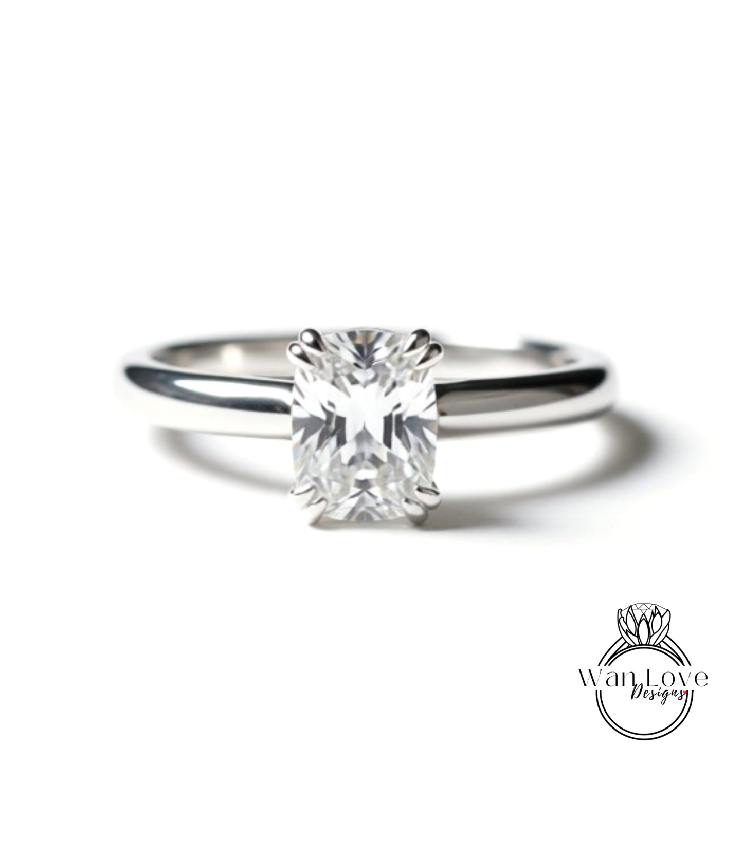 A close-up view of a diamond engagement ring with a large, clear gemstone set in a silver band.