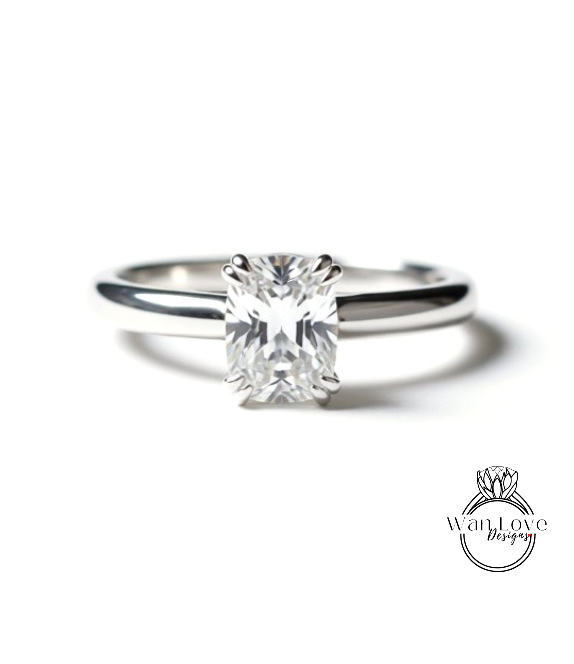 A close-up view of a diamond engagement ring with a large, clear gemstone set in a silver band.
