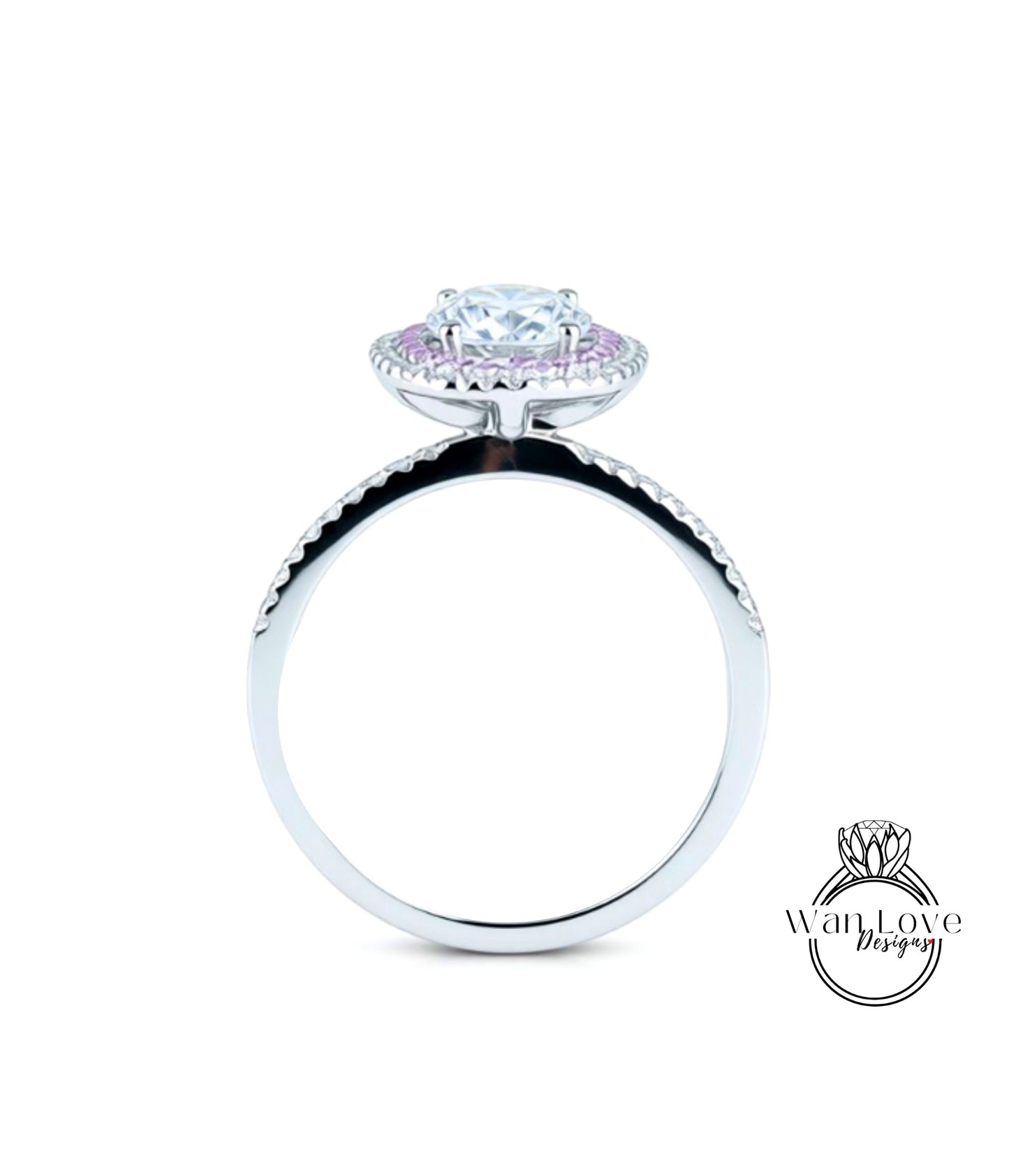 A silver ring with a large, round diamond at the center, surrounded by smaller diamonds.