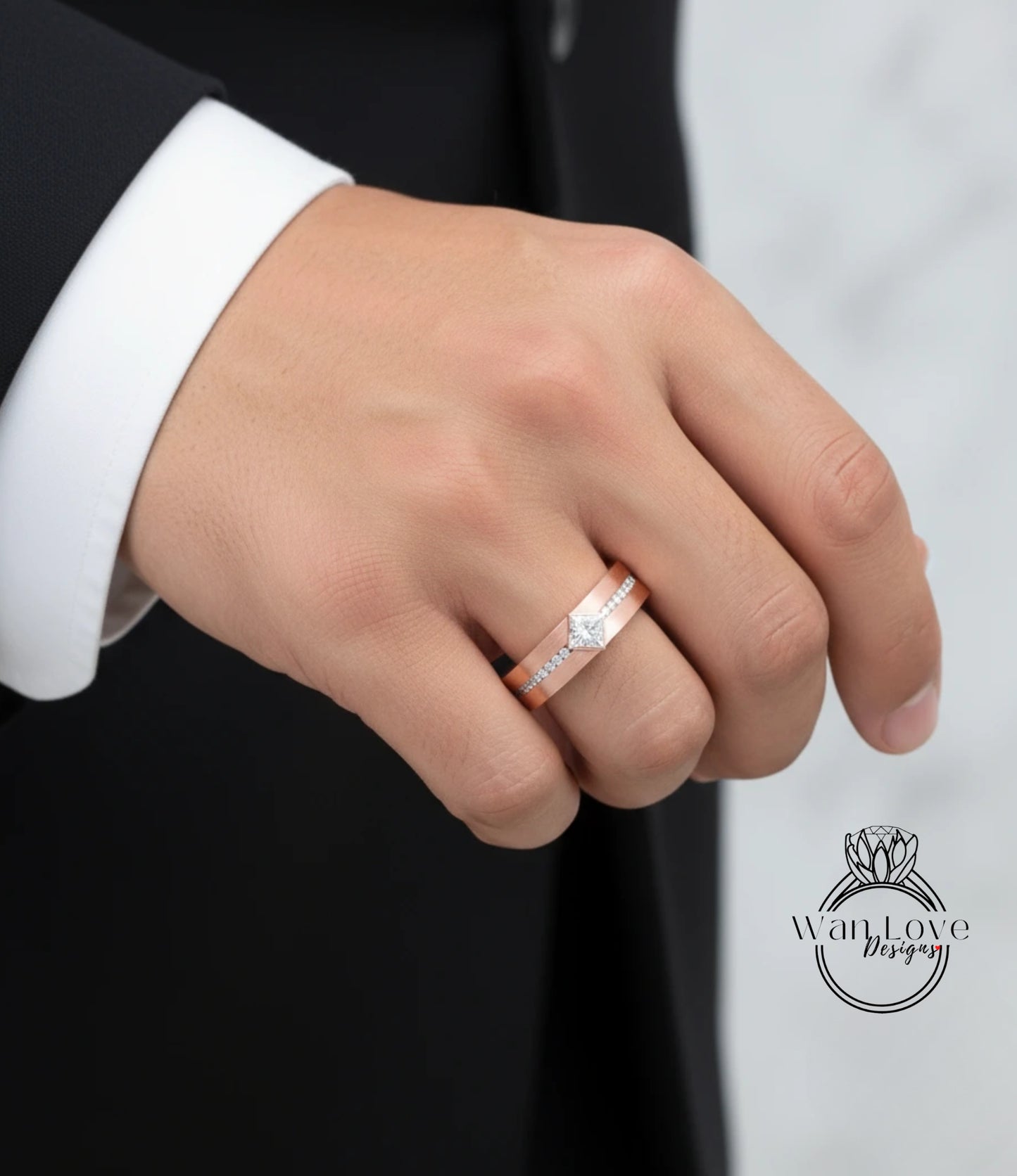 A close-up of a person's hand wearing a gold wedding band with a diamond.