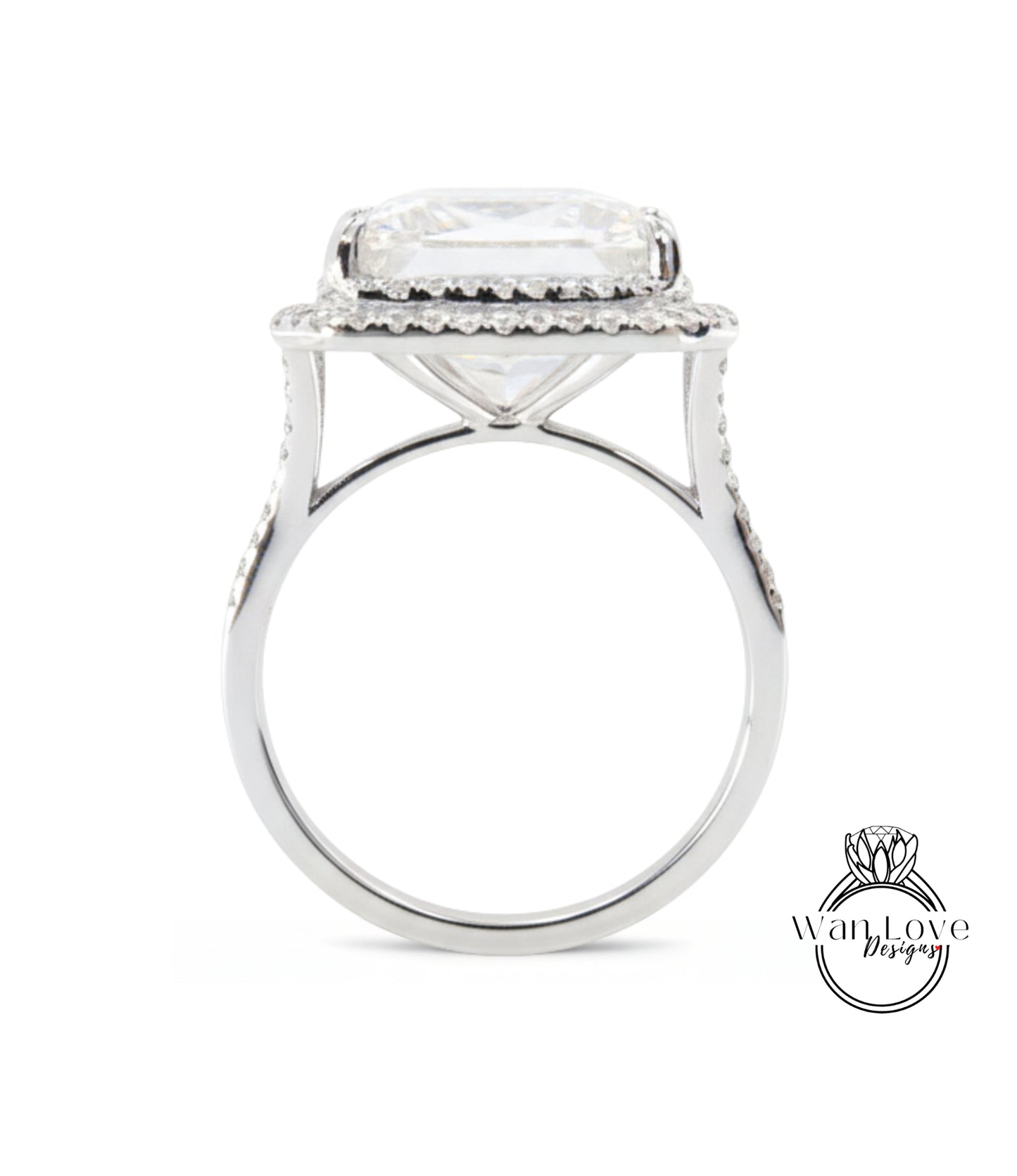 A large, white diamond engagement ring with a halo of smaller diamonds around the center stone.