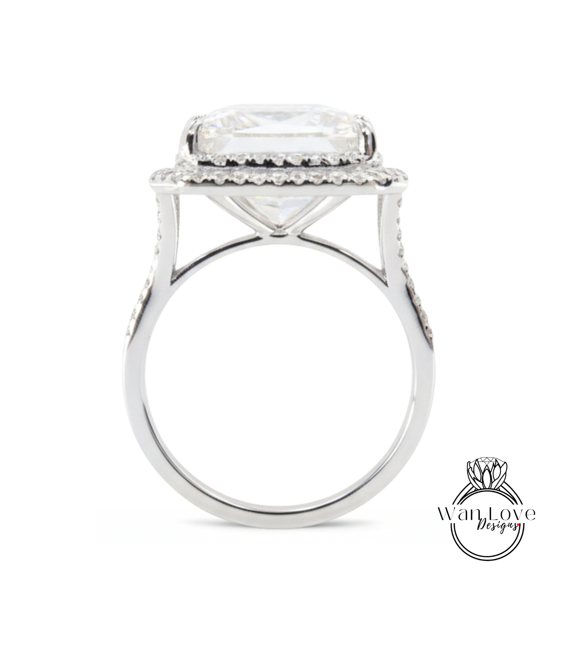 A large, white diamond engagement ring with a halo of smaller diamonds around the center stone.