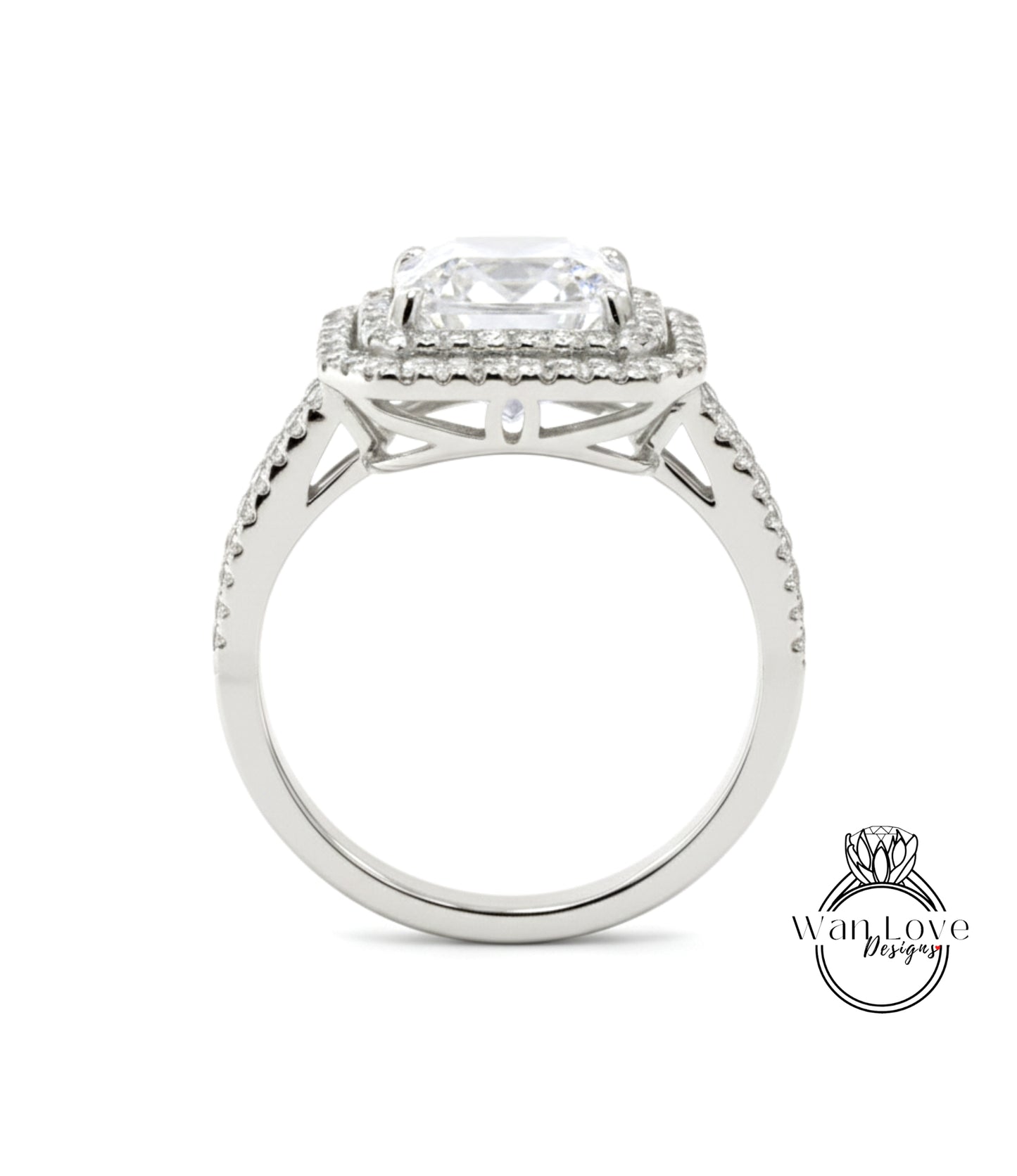 A silver engagement ring with a large central diamond surrounded by smaller diamonds on the band.