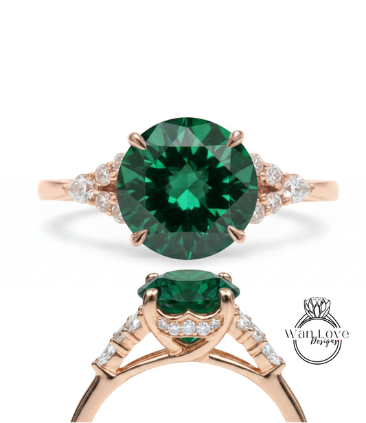 a beautiful engagement ring with a large, round green gemstone set in a rose gold band. The band is adorned with smaller diamonds, adding to the elegance of the design. The image showcases the ring from various angles, highlighting its intricate details and craftsmanship.