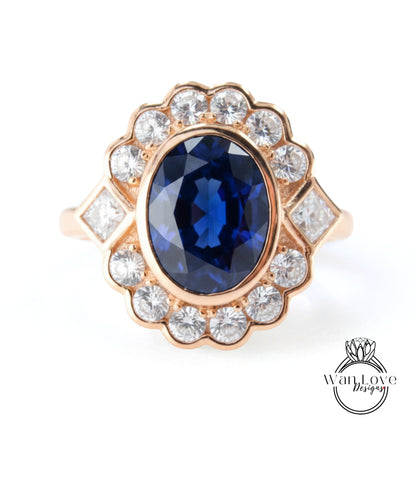 A gold ring with a large blue gemstone at the center, surrounded by smaller diamonds.