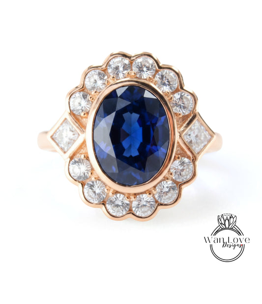 A gold ring with a large blue gemstone at the center, surrounded by smaller diamonds.