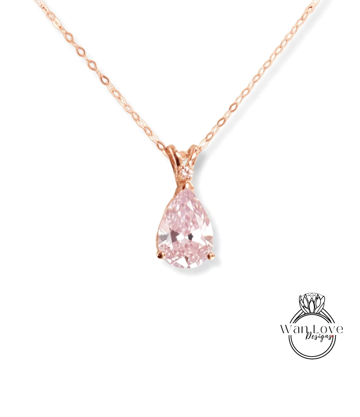 A delicate rose gold necklace with a single, large, clear pink diamond pendant.