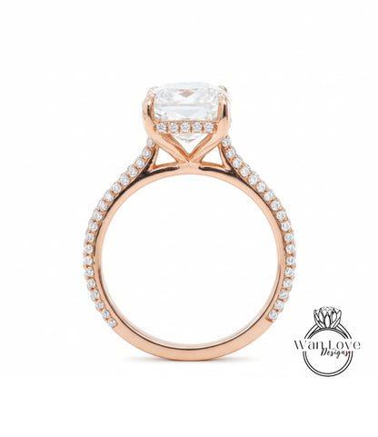 A beautiful rose gold engagement ring with a large, clear gemstone set in the center.